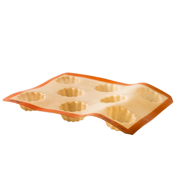 Silpat Perfect Mini Fluted Cake Mold filled with batter