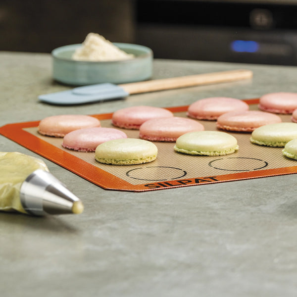 Silpat Macaron Baking Mat With Pastel Macarons On The Mat