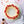 Decorative dessert with raspberries on a light blue plate