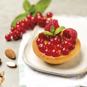 Silpat Perfect 12 Tartelette Mold filled with tart dough