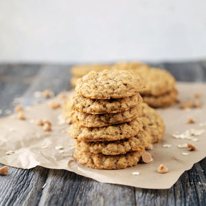 Golden cookie fresh out of the oven on Silpat silicone mat.