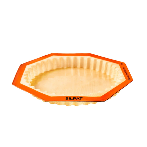 Unmolding tartlets from the Silpat Fluted Tart Mold