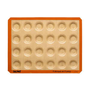 Silpat Mini Tartelette Mold on a baking tray with ready-to-fill crusts