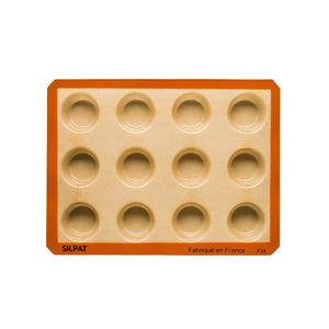 Close-up of nonstick silicone muffin mold with 12 cavities