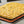 Square focaccia with herbs on a Silpat mat